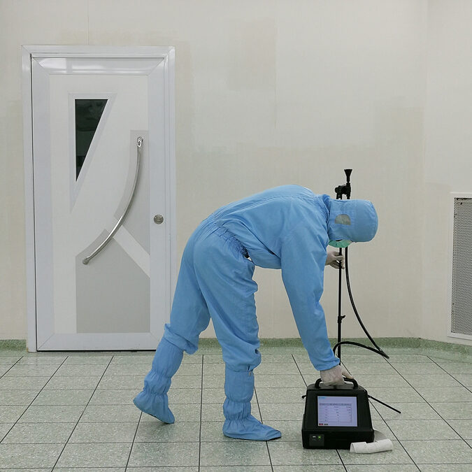 Inspector are testing dust inside the operating room with Particle Counter.